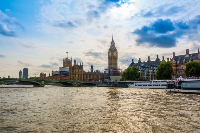 View of Big Ben and Parliament from Thames River Boat - London, England