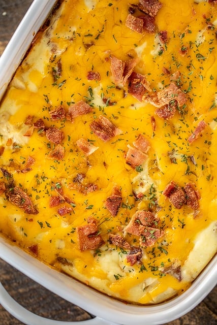 Low-Carb Crack Chicken Casserole - seriously delicious! You'll never miss the carbs! Chicken, cheddar, bacon, ranch, eggs, heavy cream. Can make in advance and freeze for a quick meal later. Everyone LOVES this casserole! #chicken #casserole #lowcarb