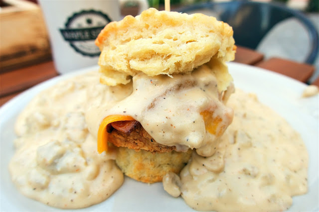 Maple Street Biscuit Company - The Five - Flaky biscuit, all natural fried chicken breast, pecan wood smoked bacon, cheddar cheese topped with sausage gravy with a little kick. The BEST sausage gravy I've even eaten!