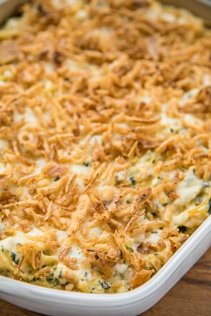 Monterey Chicken Spaghetti Casserole - my whole family went crazy over this easy chicken casserole!! Even our super picky eaters! Chicken, spaghetti, sour cream, cream of chicken, spinach, Monterey Jack Cheese, and french fried onions. Makes a great freezer meal! This is the most requested dinner in our house. #casserole #chickendinner #chickencasserole
