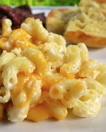 OMG Mac and Cheese Recipe...nice and light (NOT!) Tastes amazing! Macaroni, boursin cheese, heavy cream, cream cheese and cheddar. One bite and you'll know why it's called OMG Mac and Cheese!