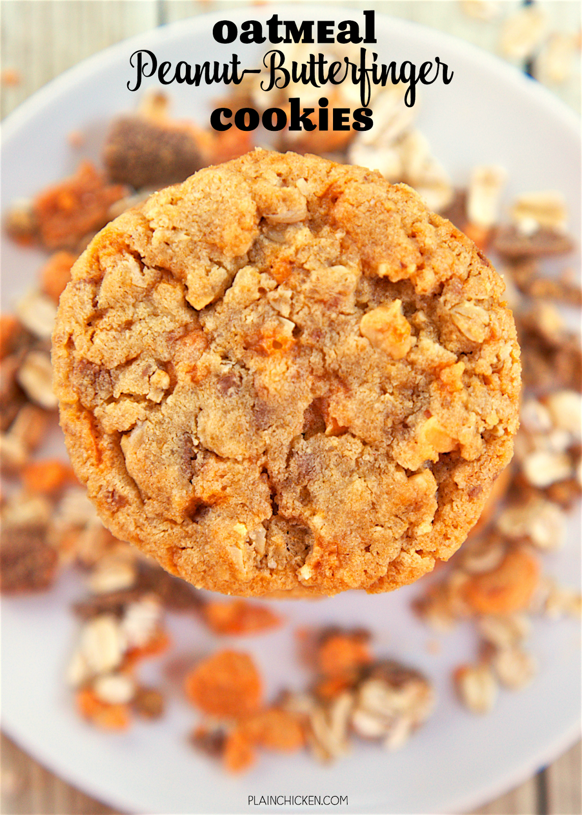 Oatmeal Peanut-Butterfinger Cookies  - peanut butter, oatmeal, Butterfinger bits, eggs, flour, baking soda, brown sugar, white sugar and the secret ingredient - LouAna® 100% Pure Coconut Oil. Our new FAVORITE cookie! I love everything about these cookies!! Can make ahead and freeze dough for later. Took these to a party and they were gone in a flash!