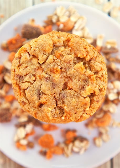 Oatmeal Peanut-Butterfinger Cookies  - peanut butter, oatmeal, Butterfinger bits, eggs, flour, baking soda, brown sugar, white sugar and the secret ingredient - LouAna® 100% Pure Coconut Oil. Our new FAVORITE cookie! I love everything about these cookies!! Can make ahead and freeze dough for later. Took these to a party and they were gone in a flash!