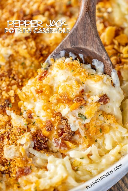 Pepper Jack Potato Casserole - our favorite potato casserole recipe. It is like a cross between traditional potato casserole and scalloped potatoes. LOVE the cheesy bacon cracker crust!!! Frozen shredded hash browns, cream of chicken soup, heavy cream, pepper jack cheese, butter, sour cream, onion powder, garlic powder, ritz crackers, parmesan and bacon. Can make ahead and freeze for later. I always have a batch on hand for a quick and delicious side dish!