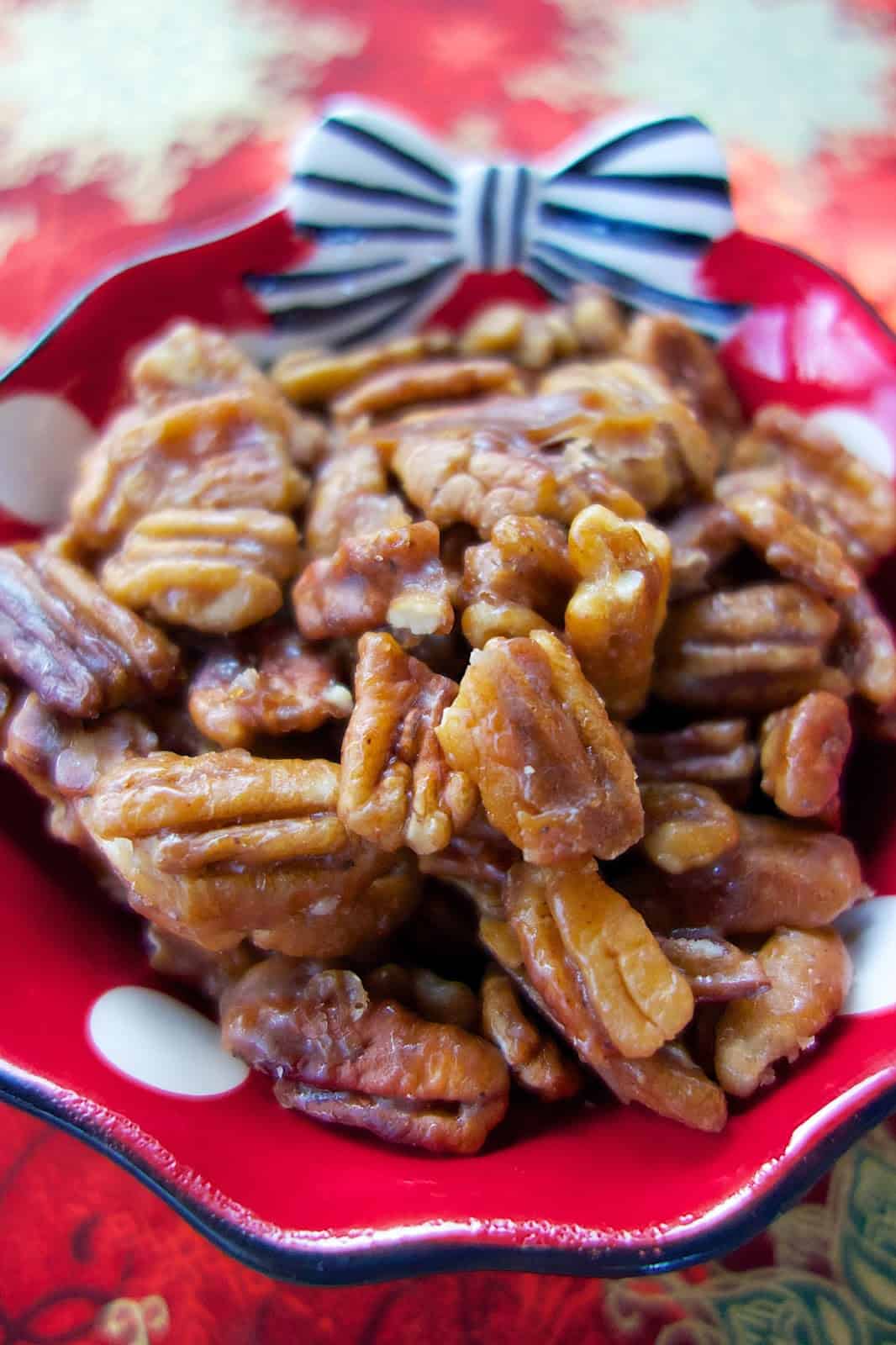 Peppered Glazed Pecans - you'll want to double the recipe - they go fast! Pecans coated in brown sugar, butter, corn syrup, pepper and salt. Great for snacking on at holiday parties! Also makes a great homemade gift! Everyone LOVES this easy snack recipe!