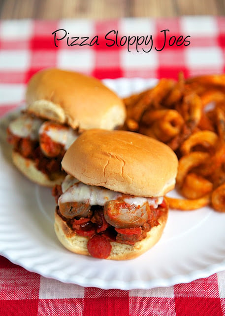 Pizza Sloppy Joes Recipe - hamburger or sausage, pepperoni, mushrooms, pizza sauce - top with mozzarella cheese. Our new favorite way to eat sloppy joes! Ready to eat in about 15 minutes!