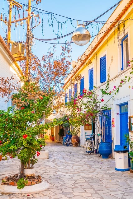 Why you should go to Poros, Greece - AHI Travel tour - where to stay, what to do and where to eat. The beach, the sunsets and food! Poros is a must on your trip to Greece!