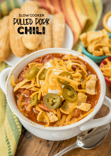 Slow Cooker Pulled Pork Chili - our all-time favorite chili! Pulled pork, Bush's chili beans, Hunt's Petite diced tomatoes, Hunt's tomato sauce, Ro*tel diced tomatoes and green chilies, chili seasoning, minced onion, and tomato juice. Just dump everything in the slow cooker and let it work its magic! Makes a ton - great for tailgating, potluck, holiday get-togethers. Can freeze leftovers for a quick meal later! LOVE this chili!!! #ad #WMChiliPride #slowcooker #chilirecipe