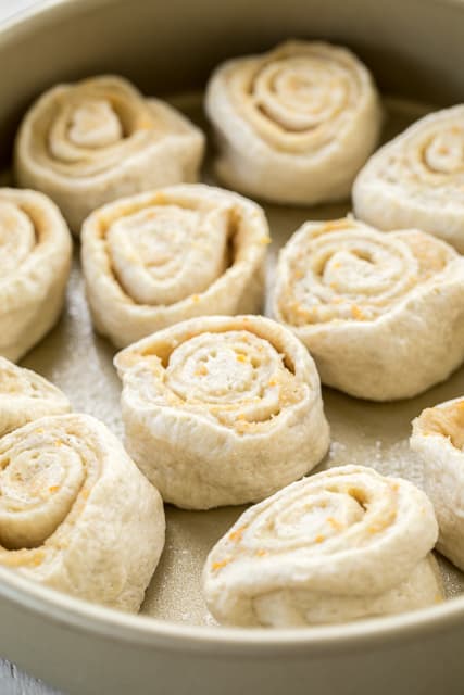 Quick Orange Rolls recipe - AMAZING!!!! We eat these almost every weekend. They are so good! Ready from start to finish in about 30 minutes. French bread dough, cream cheese, brown sugar, orange zest, granulated sugar, powdered sugar and orange juice. You'll never buy the canned orange rolls again. These just can't be beat!!! #cinnamonrolls #breakfast #orangerolls #sweetrolls
