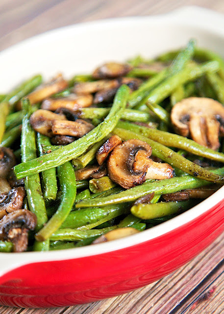 Roasted Green Beans and Mushrooms Recipe - fresh green beans and mushrooms tossed in olive oil, balsamic, garlic salt, pepper and baked. SO simple and SOOO delicious! Ready in about 20 minutes.