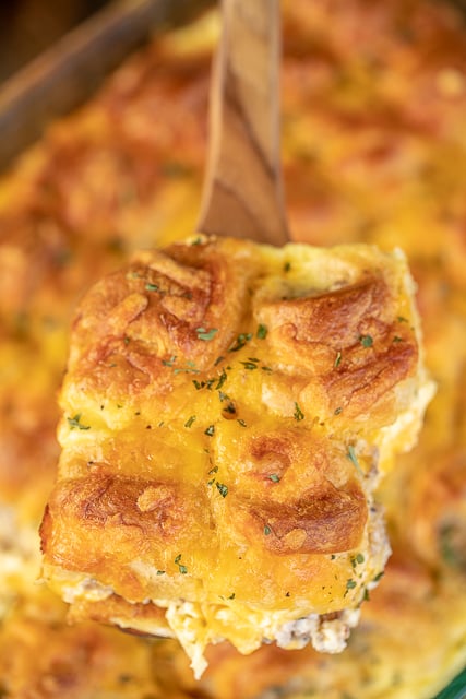 Sausage & Cream Cheese Crescent Breakfast Casserole - the BEST breakfast casserole in the world!!! Crescent rolls stuffed with sausage and cream cheese then topped with an egg mixture and bake. All of my favorites in on dish!!! Can make in advance and bake the next morning. Crescent rolls, sausage, cream cheese, cheddar cheese, eggs, milk, salt and pepper. Everyone LOVES this easy breakfast casserole! #breakfast #breakfastcasserole #casserole #sausage #recipe