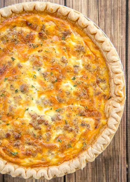 Sausage and Ranch Quiche - so quick and easy. Everyone LOVED this recipe!! Can make ahead and freeze for later. Pie crust, sausage, ranch dressing, cheddar cheese, heavy cream, eggs, and pepper. Ready to eat in an hour. Great for breakfast, lunch or dinner. THE BEST!