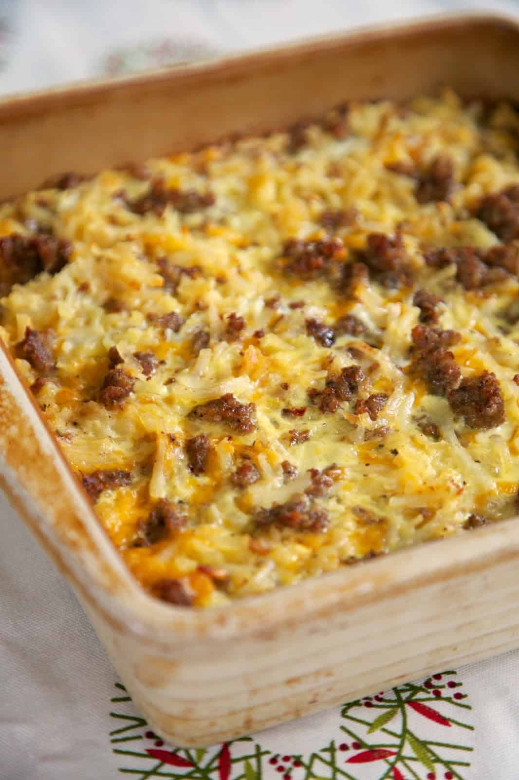 Sausage Hash Brown Breakfast Casserole - hash browns, sausage, eggs & cheese - can be made ahead of time and refrigerated until ready! Great for overnight guest and Christmas morning!