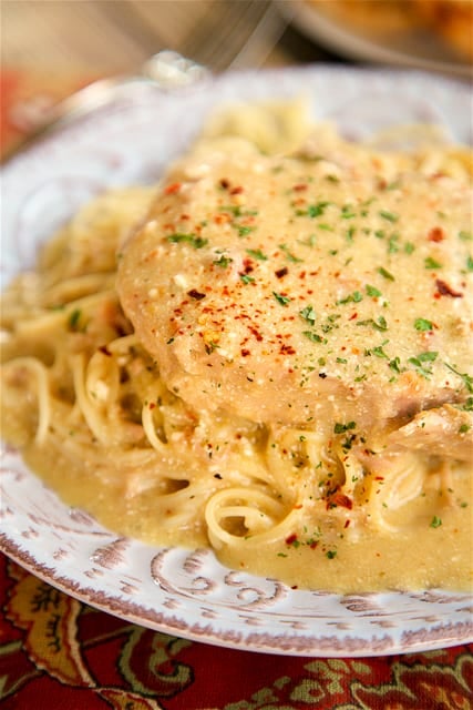 Slow Cooker Angel Pork Chops - THE BEST pork chops EVER! Everyone cleaned their plate!!! SO tender and full of flavor. Pork chops, Italian dressing mix, cream cheese, butter, cream of chicken soup and white wine/chicken broth. Serve over angel hair pasta. Make sure to spoon the sauce out of the slow cooker - it is SO good!!!