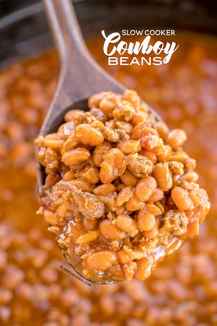 Slow Cooker Cowboy Beans - seriously the BEST baked beans I've ever eaten!!! Loaded with beef and bacon. SO easy to make! Great for potlucks and cookouts. Ground beef, bacon, onion, baked beans, ketchup, mustard, beef broth, garlic, brown sugar. I took these to a cookout and everyone asked for the recipe. A new favorite!! #slowcooker #bakedbeans #cookout #sidedish