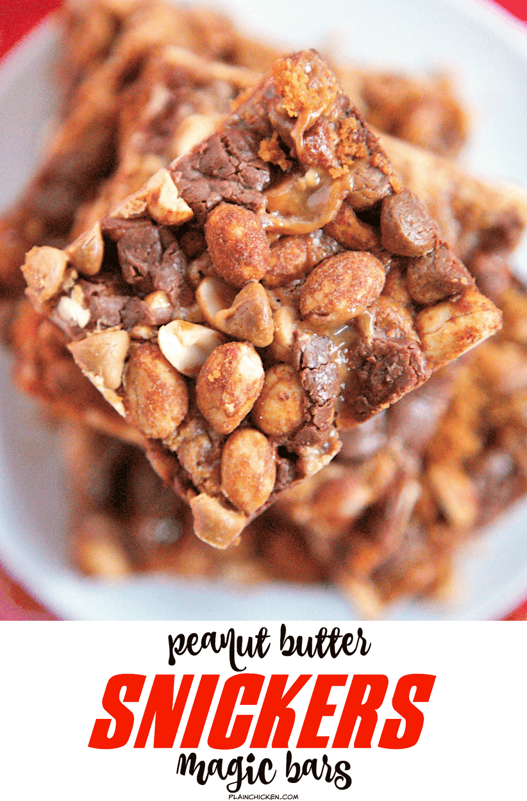 Peanut Butter Snickers Magic Bars - snickers baking bites, peanut butter chips, honey roasted peanuts on top of a graham cracker crust and drowned in sweetened condensed milk. SO easy to make and SOOO delicious! Everyone raved about them!