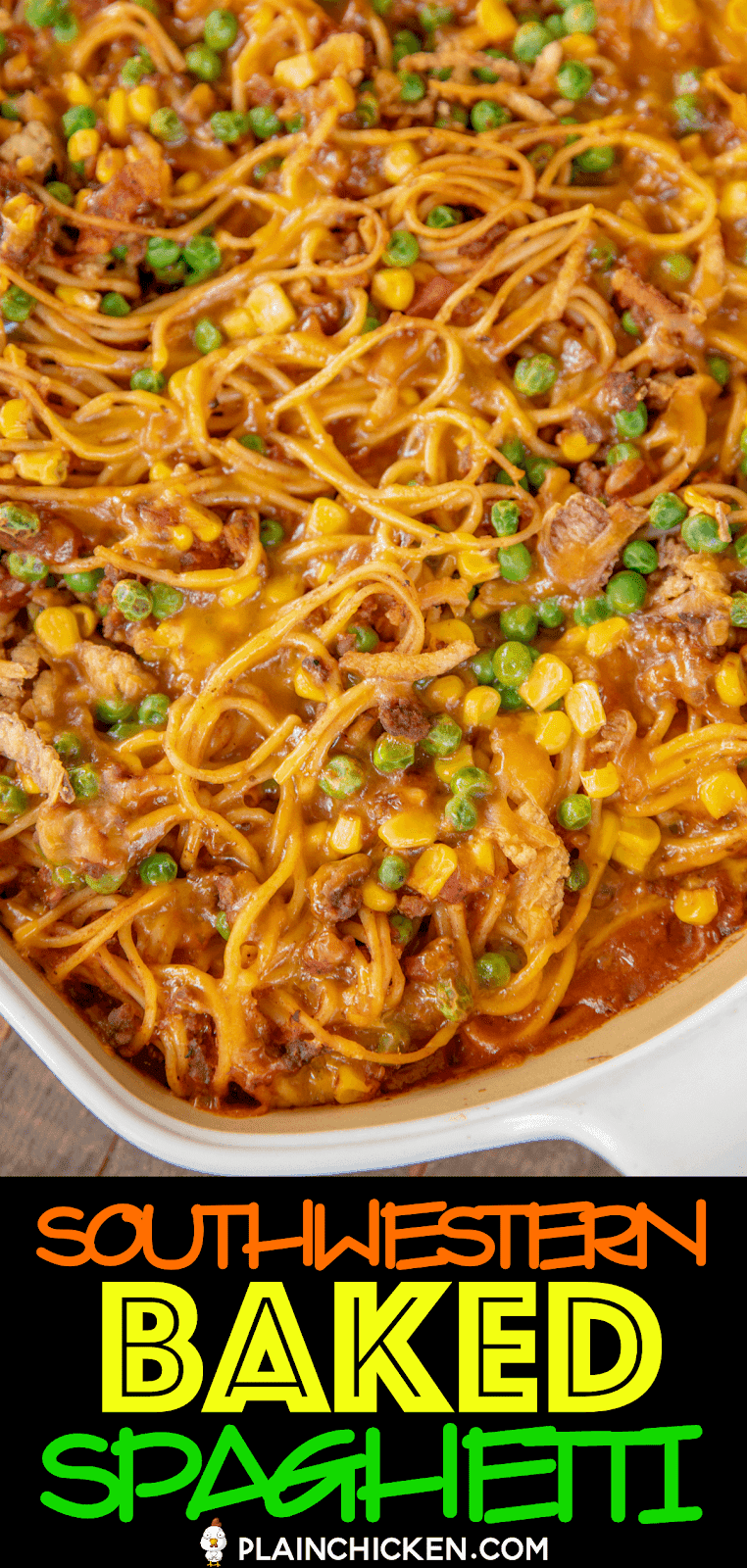 baked spaghetti with corn and peas in a casserole dish