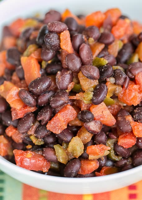 Southwestern Black Beans - only 4 ingredients! Black beans, diced tomatoes and green chiles, chili powder and lime juice. We make them all the time! Ready in 5 minutes!! Such a quick and easy side dish!!