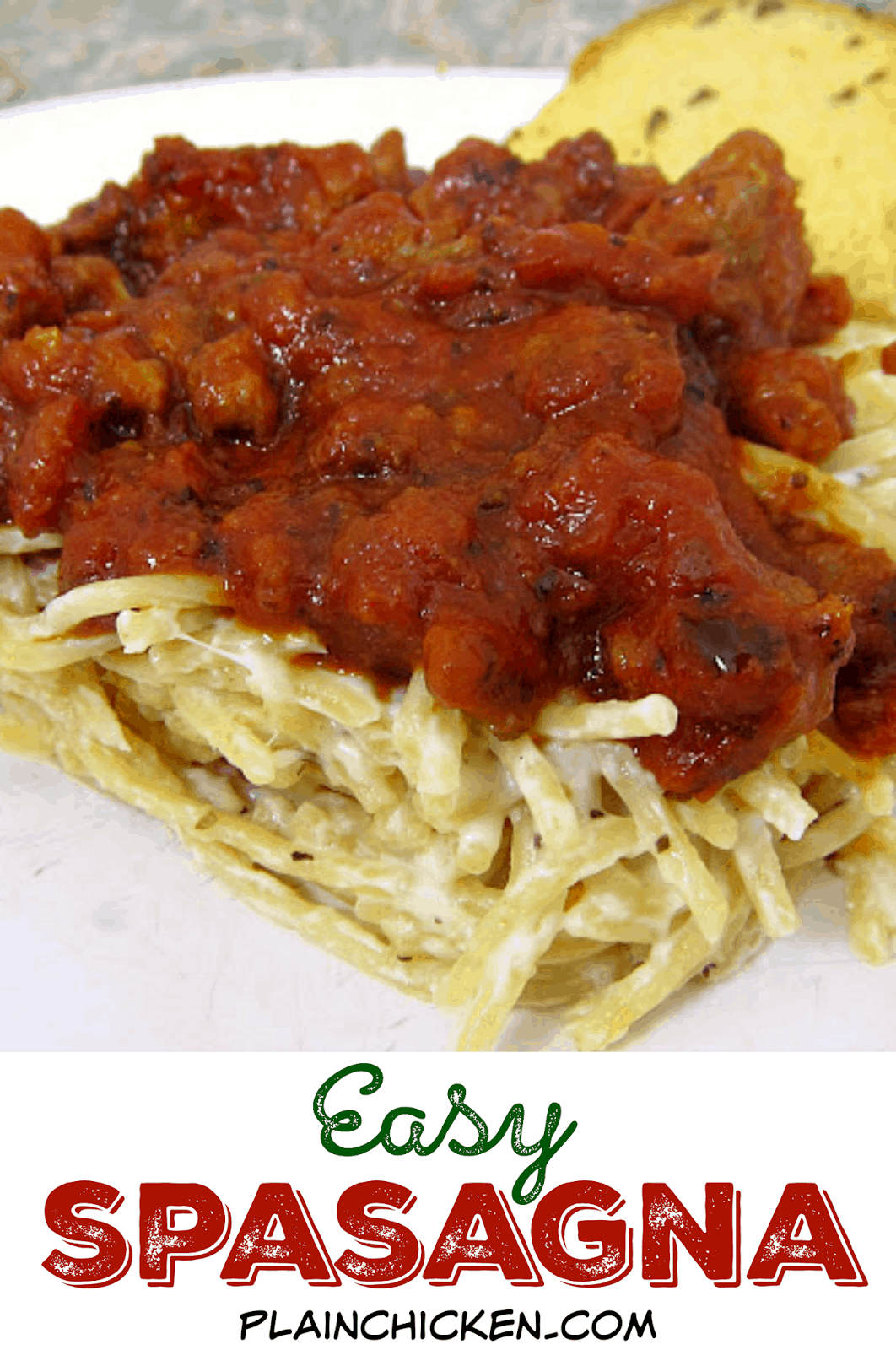Easy Spasagna Pasta Casserole - spaghetti and lasagna combined to make one amazing casserole! Spaghetti, alfredo sauce, cheese, hamburger and pasta sauce. Ready to eat in 30 minutes! Can also freeze for later. Add a salad and garlic bread for a quick and delicious weeknight meal!