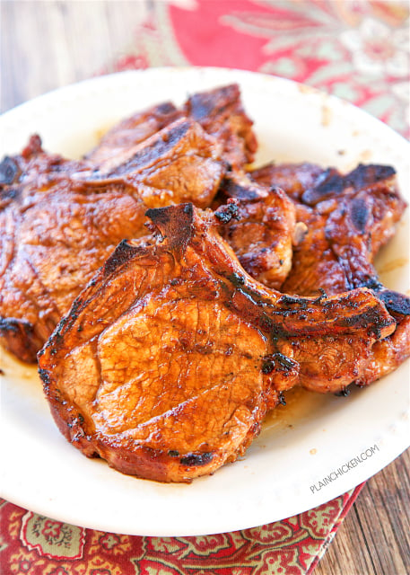 Sriracha Grilled Pork Chops - CRAZY good!! Only 6 ingredients!! Teriyaki sauce, Worcestershire sauce, sriracha, brown sugar, garlic and pork chops. Ready in minutes on the grill. These are THE BEST pork chops I've ever eaten. Tender, juicy, sweet and spicy in one bite.