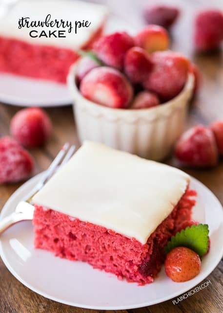 Strawberry Pie Cake - doctored up cake mix with strawberry pie filling and vanilla extract. Topped with a quick homemade white chocolate frosting. This cake is requested for birthday's and potlucks! SO good!