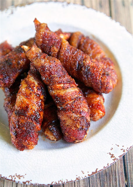 Sweet & Spicy Bacon Wrapped Chicken Tenders - one of the best things we ate last week. Only 4 simple ingredients - chicken, bacon, brown sugar and chili powder. They only take about 5 minutes to make and are ready to eat in under 30 minutes. Sweet and salty in one bite! 