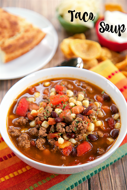 Taco Soup recipe - ground beef, taco seasoning, Ranch seasoning, pinto beans, black beans, corn, Rotel and water - ready in 20 minutes! Great freezer meal! Can also cook in slow cooker all day.