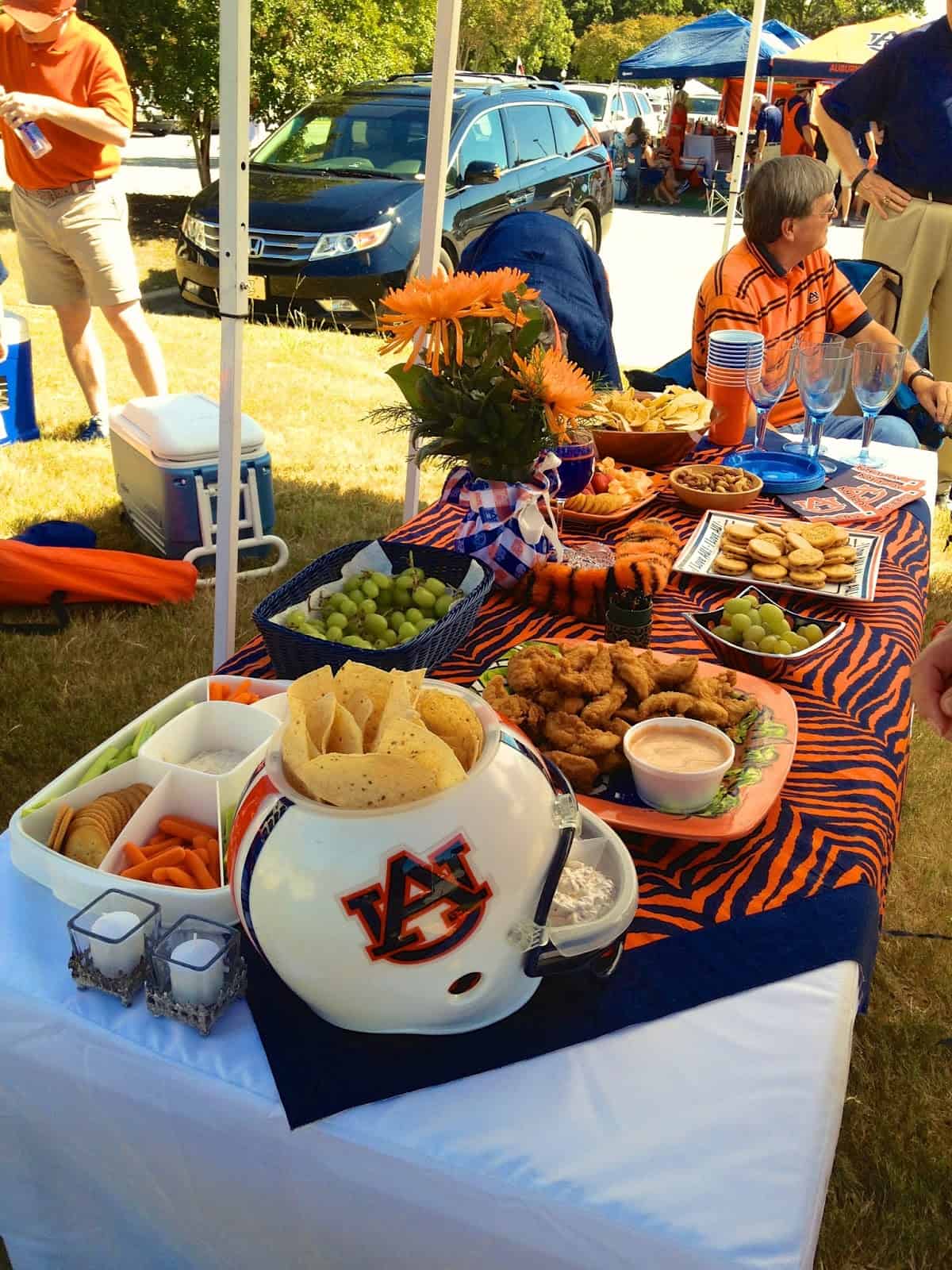 Tailgating Essentials - everything you need for the ULTIMATE tailgate party! What to bring to the parking lot and the BEST tailgate recipes on the internet!