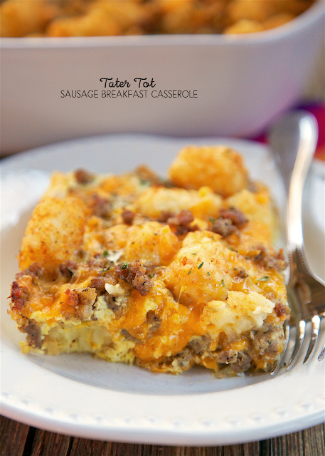 Tater Tot Sausage Breakfast Casserole - great make ahead recipe!  Sausage, cheddar cheese, tater tots, eggs, milk, garlic, onion and black pepper. Can refrigerate or freeze for later. Great for breakfast. lunch or dinner. Everyone loves this easy breakfast casserole!!