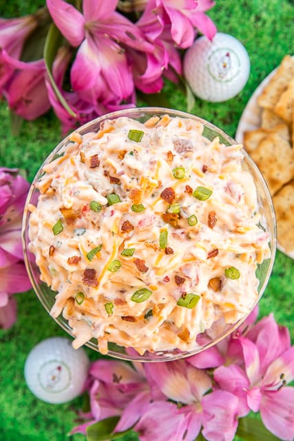 Cracked Out Pimento Cheese - pimento cheese loaded with cheddar, bacon and ranch! Dangerously delicious!! Great as a dip or on a sandwich. Cheddar cheese, pimentos, mayonnaise, ranch dressing mix, bacon, green onions. So simple and it tastes AMAZING! Perfect for watching The Masters golf tournament! #crack #pimentocheese #cheese #themasters #dip