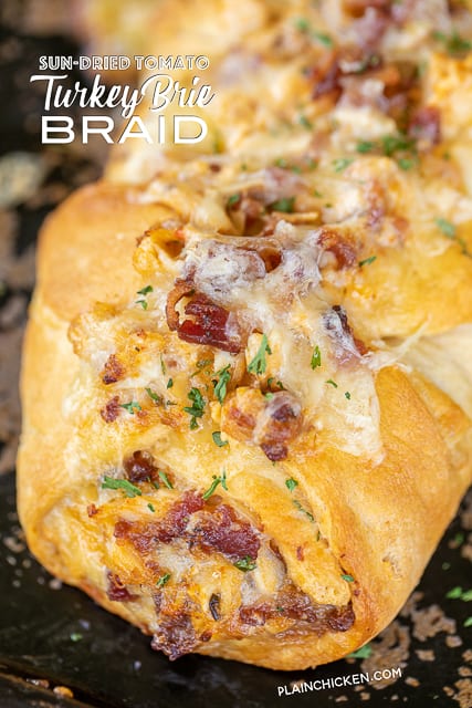 Sun-Dried Tomato Turkey Brie Braid - seriously delicious!!! Great way to use up any holiday turkey! Turkey, mayo, sun-dried tomato pesto, bacon and brie wrapped in crescent rolls and baked.We love this easy sandwich. Perfect for a quick lunch, dinner or appetizer. #leftoverturkey #turkey #sandwich