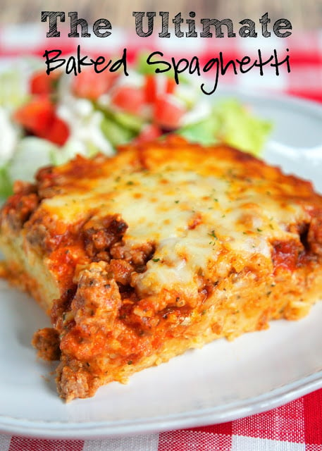 The Ultimate Baked Spaghetti - cheesy spaghetti topped with Italian seasoned cream cheese, meat sauce and mozzarella cheese - SOOOO good! Makes a great freezer meal too! We ate this two days in a row!
