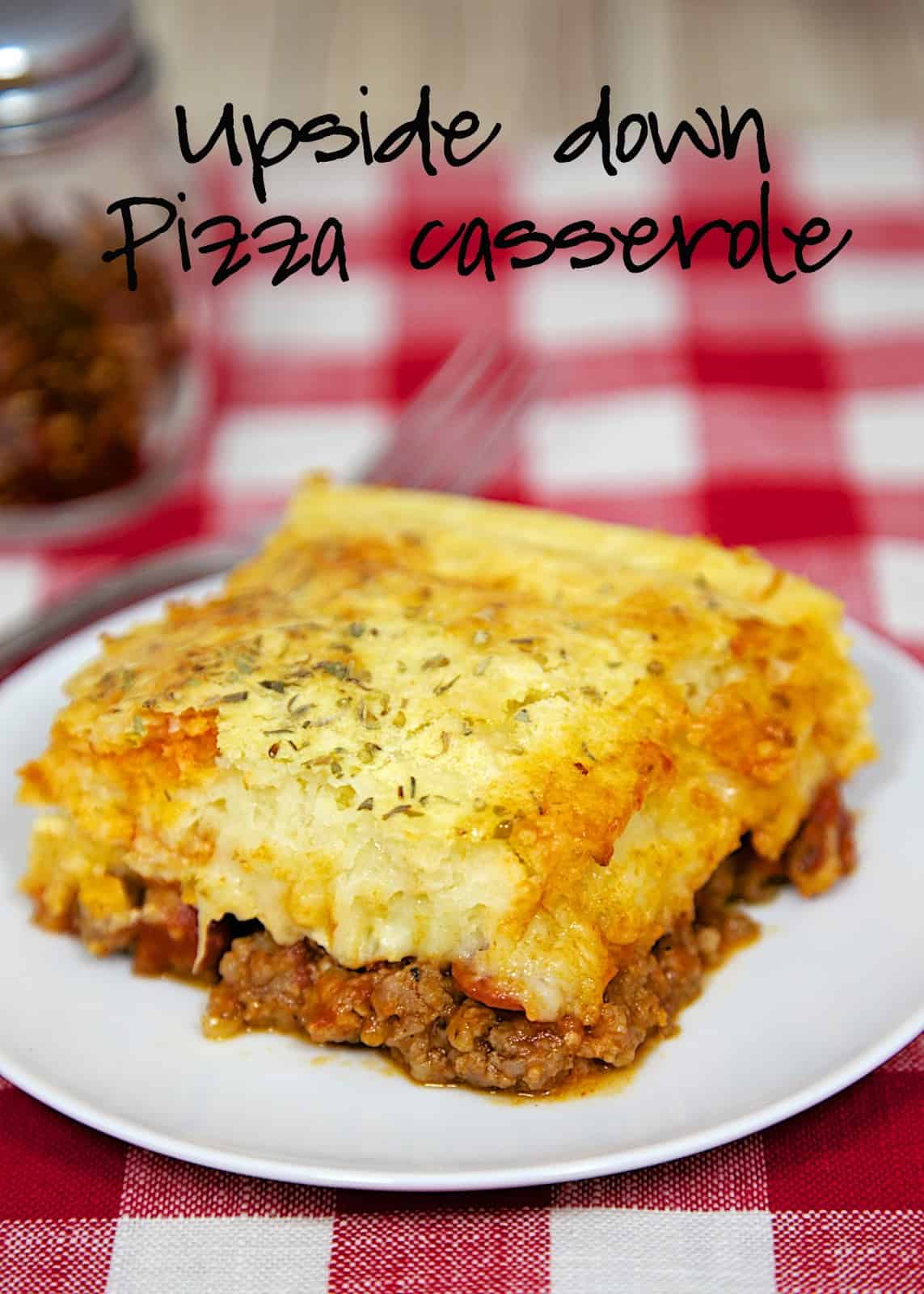Upside Down Pizza Casserole Recipe - quick pizza casserole with the crust baked on top. Use your favorite pizza toppings. It was gone in a flash!! Great change to regular pizza.
