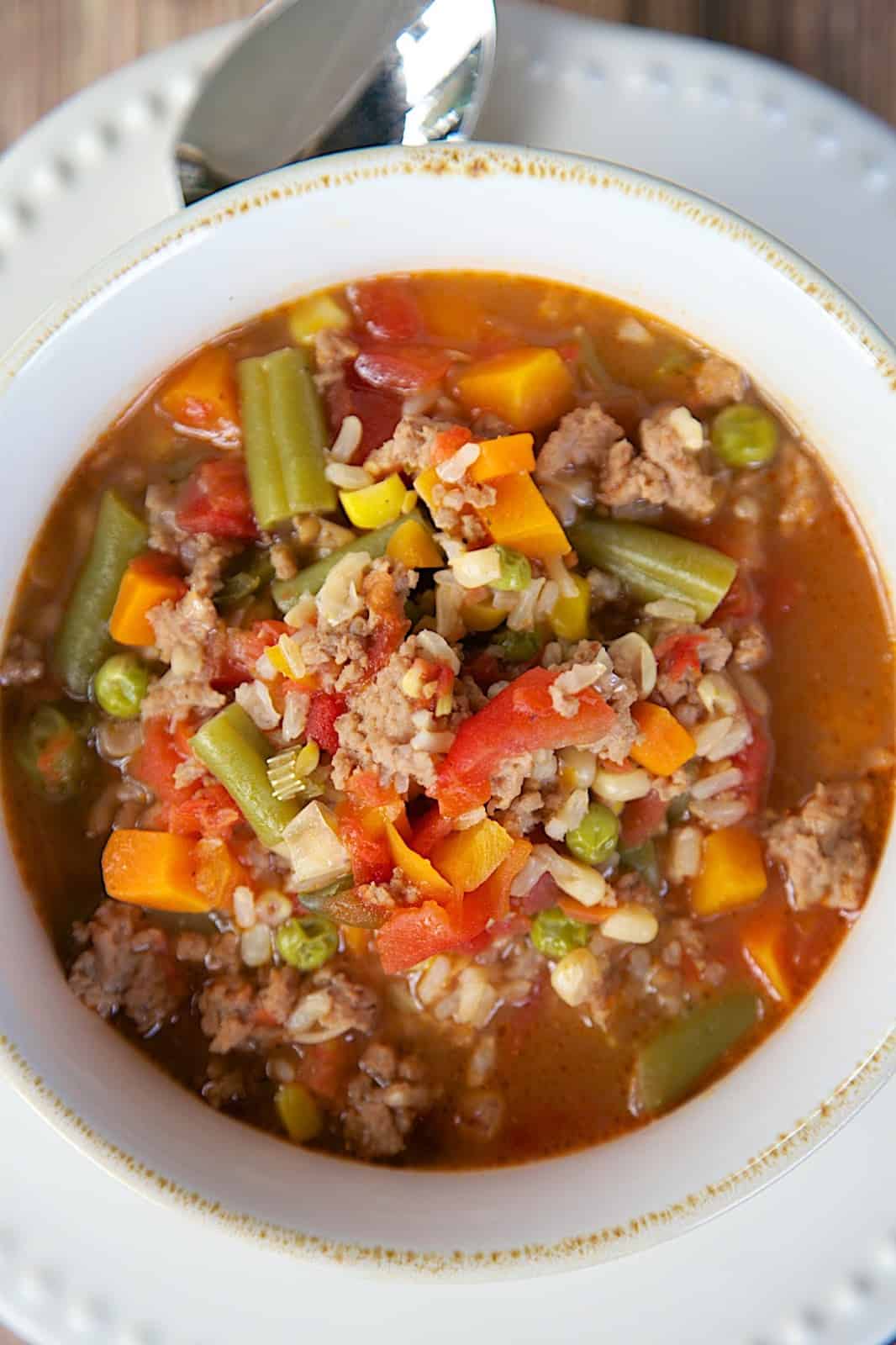 Turkey Vegetable Soup - ground turkey, mixed vegetables, beef broth and brown rice - ready in under 30 minutes. Leftovers are great for lunch and it freezes well. My husband gobbled this up! I've already made it 3 times this month!!
