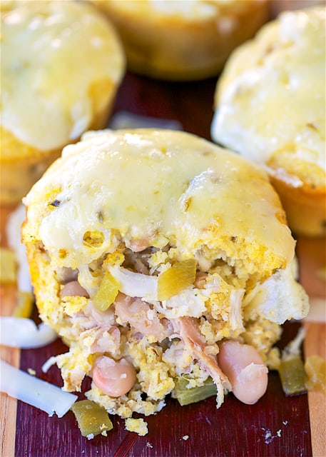 White Chicken Chili Cornbread Muffins - quick cornbread muffins stuffed with chicken, white beans, green chilies, cumin, garlic, oregano and pepper jack cheese. Everyone loved these muffins! Comfort food at its best! Great for lunch, dinner or tailgating. Ready in 20 minutes!!