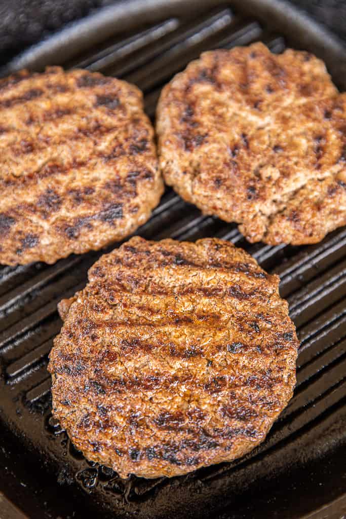 spicy burgers in grill pan