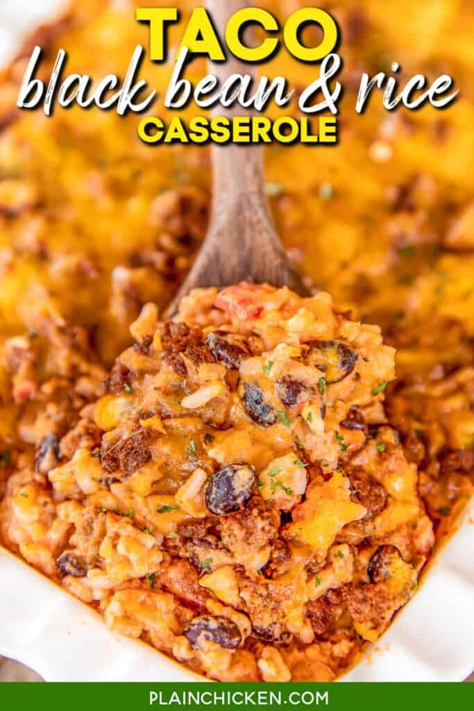 scooping taco rice casserole from baking dish