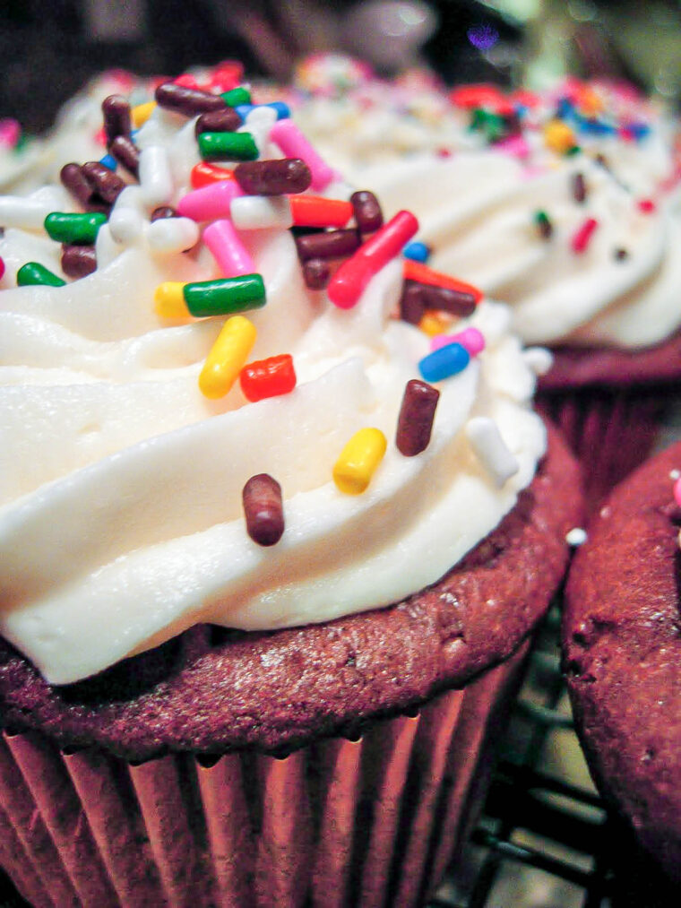 BEST Chocolate Cupcakes & Buttercream Frosting EVER - hands down the BEST cupcakes EVER! Doctor up cake mix and top it with the most delicious buttercream frosting EVER! Everyone in our family requests these cupcakes for their birthday! SO good! #cake #dessert #cupcakes #buttercream