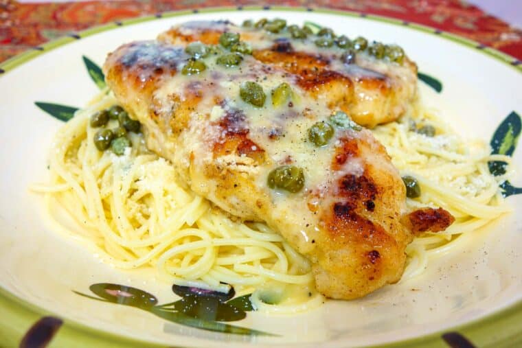 Chicken in Lemon Butter Caper Sauce - restaurant quality! You'll be blown away after one bite! Sautéed chicken, pasta and a quick homemade lemon butter caper sauce. Ready in 15 minutes!