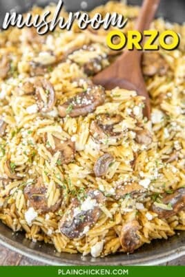 spooning orzo pasta with feta and mushrooms from the skillet with text overlay