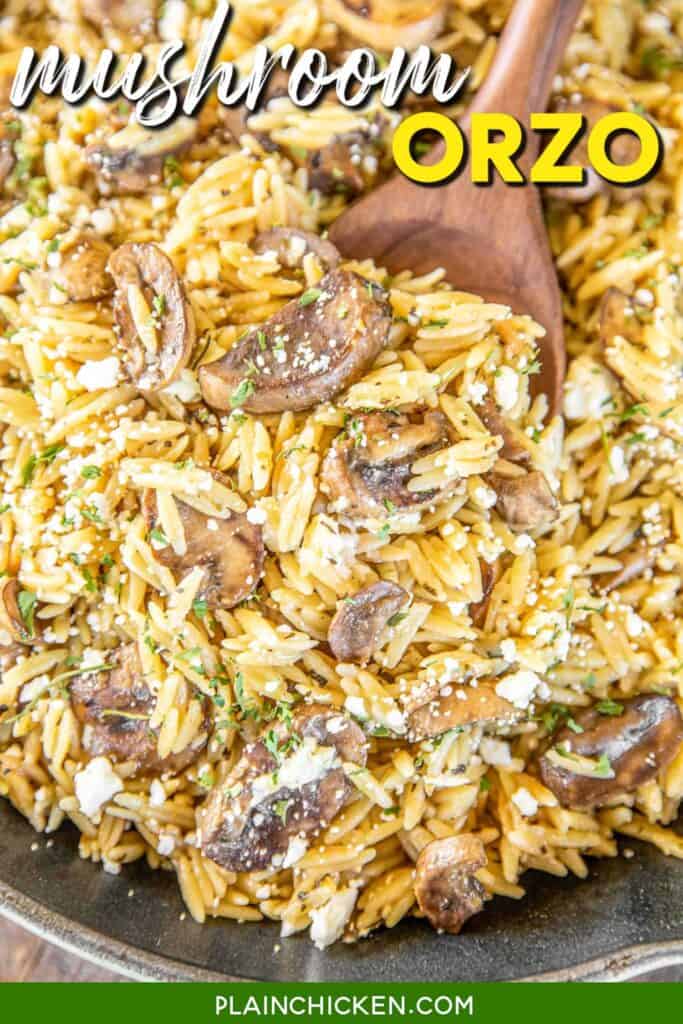 spooning orzo pasta with feta and mushrooms from the skillet with text overlay