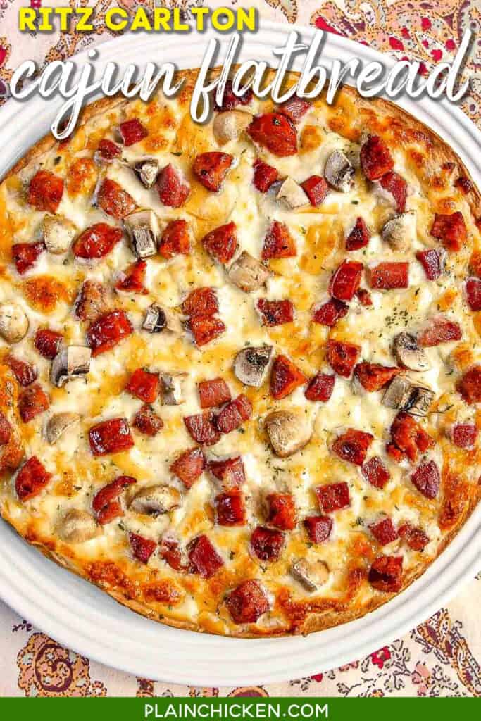 Ritz Carlton Cajun Flatbread - one of the best things we ate in NOLA! Pre-made pizza crust topped with a béchamel sauce, andouille sausage, tasso ham, mushrooms and cheese. SO good. So glad the hotel gave me the recipe!