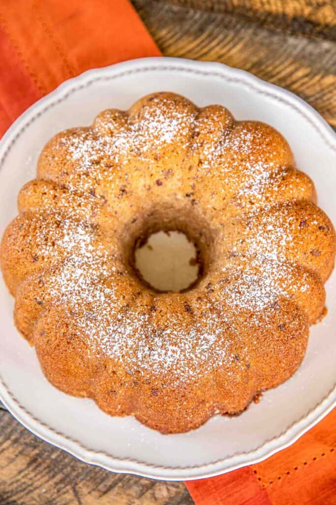 Butter Pecan Pound Cake - only 5 ingredients! Butter pecan cake mix, water, oil, eggs and a can of coconut pecan frosting. I couldn't believe how delicious this cake tasted. Can make a few days in advance and store in an air-tight container. Great for your holiday meal! #cake #bundtcake #dessert #thanksgiving #christmas