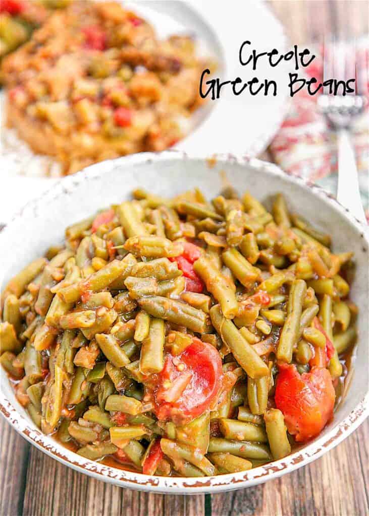Creole Green Beans Recipe - transform canned green beans into something amazing! Green beans, bacon,onion, green pepper, brown sugar, mustard, stewed tomatoes and Worcestershire sauce. SO good! I could make a meal out of these green beans!