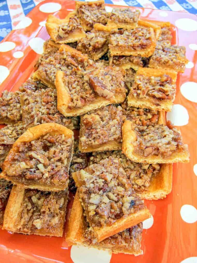 Easy Crescent Pecan Bars - crescent roll crust topped with a delicious pecan pie filling. SO easy and they taste amazing!!! There are never any left! Everyone always asks for the recipe!