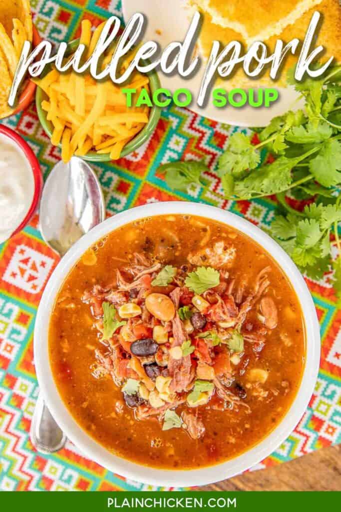 Pulled Pork Taco Soup - the BEST taco soup EVER!!! Pulled pork, pinto beans, black beans, diced tomatoes and green chiles, corn, taco seasoning, ranch seasoning, chicken broth. SO easy to make. Just dump everything in the pot, bring to a boil and simmer. Can also make in the #slowcooker. Great for tailgating and potlucks. Can freeze leftovers for a quick meal later. Our favorite taco soup recipe! #soup #taco #pulledpork