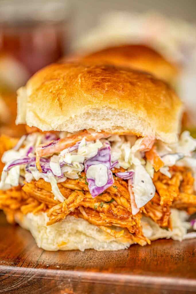 pulled chicken sandwich topped with slaw