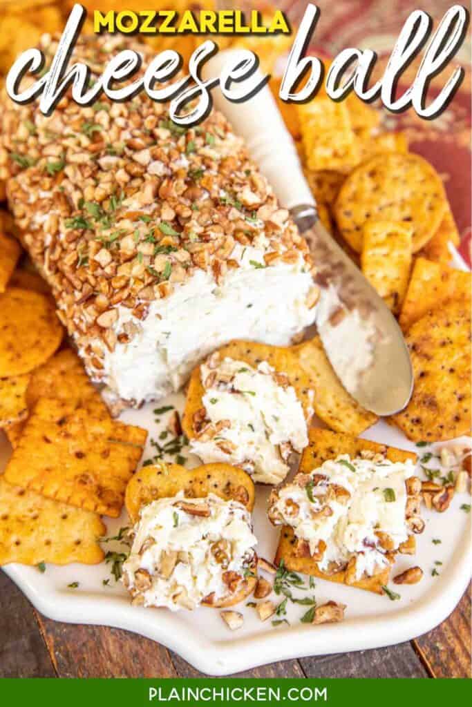 cheese ball rolled in pecans and crackers
