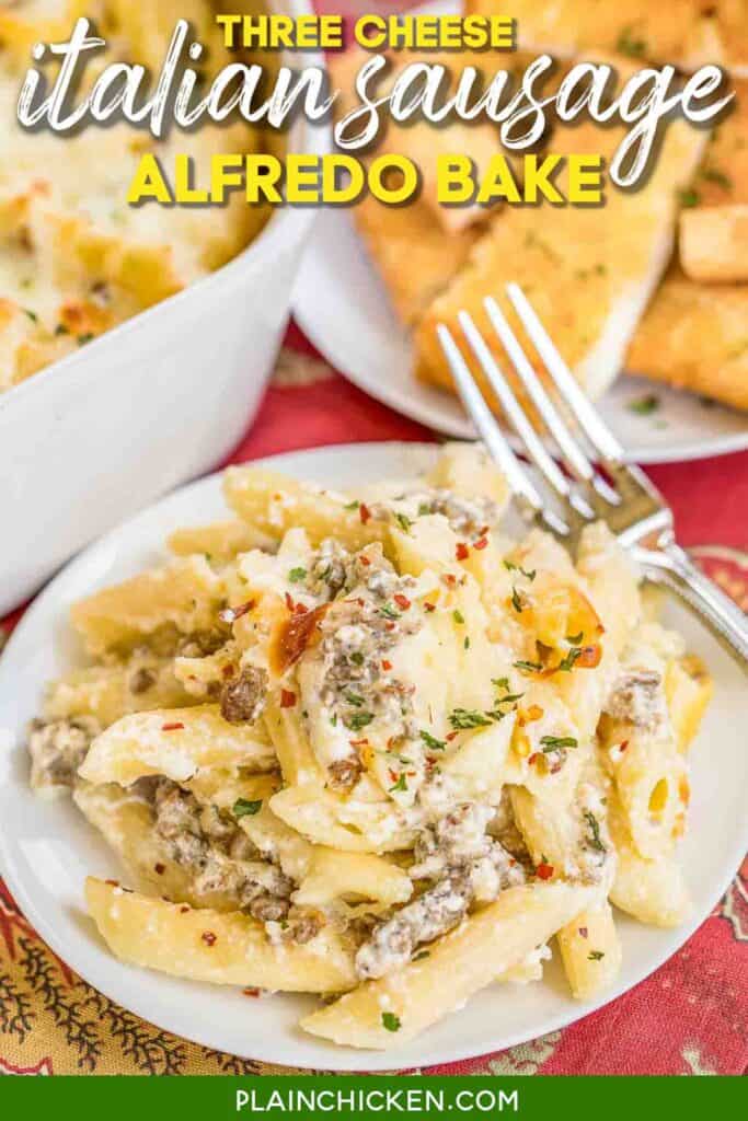 Three Cheese Italian Sausage Alfredo Bake - great make-ahead pasta dish. Elbow macaroni, alfredo sauce, sour cream, ricotta, garlic, italian sausage, eggs, parmesan and mozzarella cheese. SO good!! We make this at least once a month! Can freeze half for later. This is THE BEST pasta casserole we've ever eaten!!! #casserole #freezermeal #pasta #pastacasserole