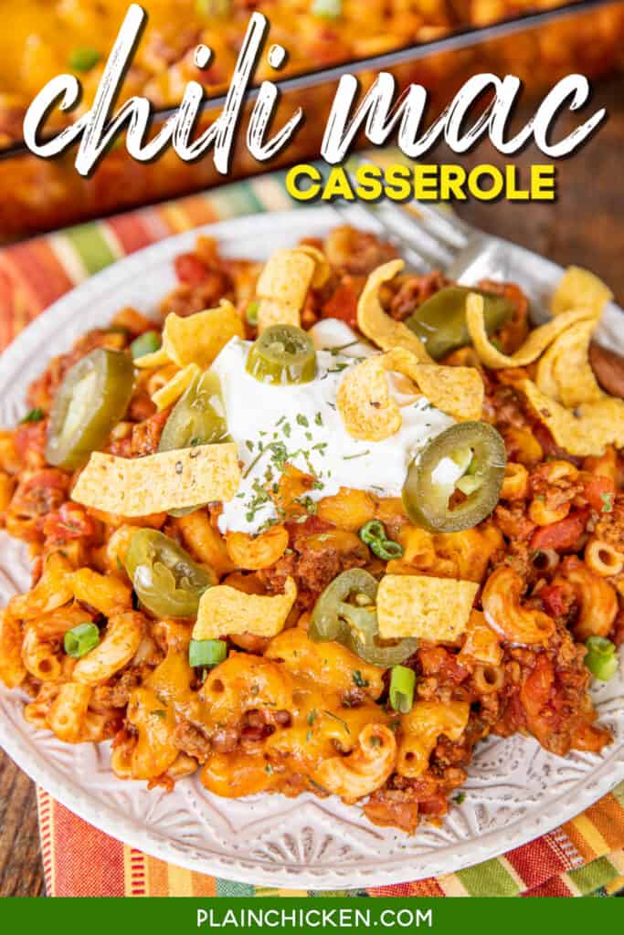 plate of chili mac with cheese, fritos, sour cream and jalapeños